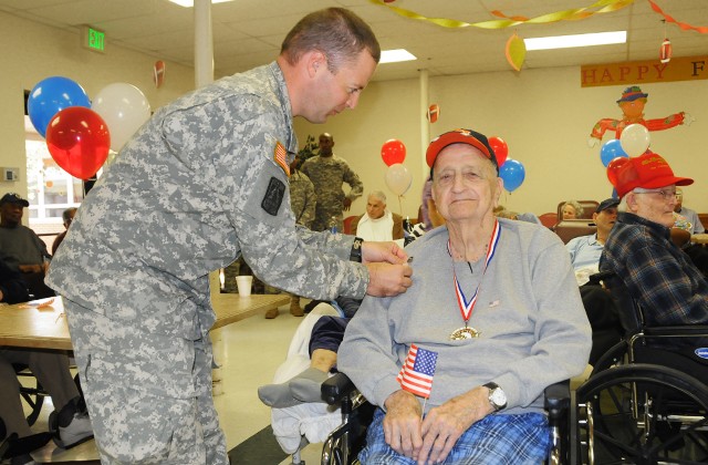 Soldiers visit veterans