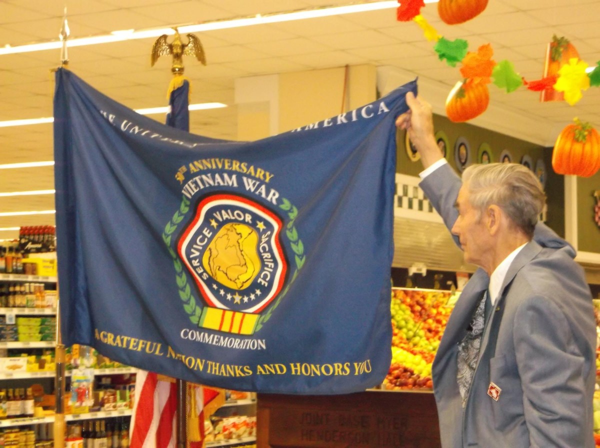 Vietnam veterans saluted with flag unveiling at commissary | Article