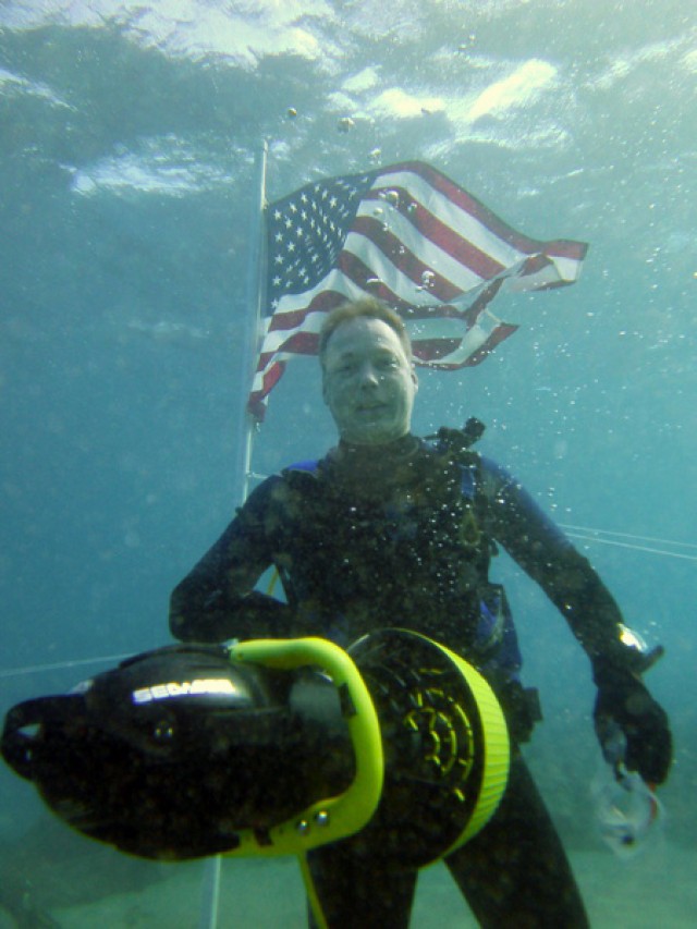 Divers unite 20 feet under in support of Veterans