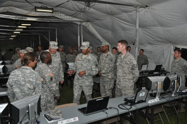 Soldiers and Airmen in the fires cell explain capabilities