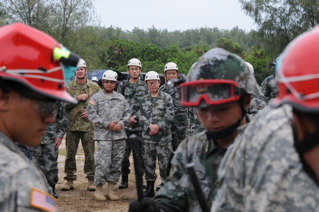US and Chinese Soldiers work Side by side during Disaster Management Exchange