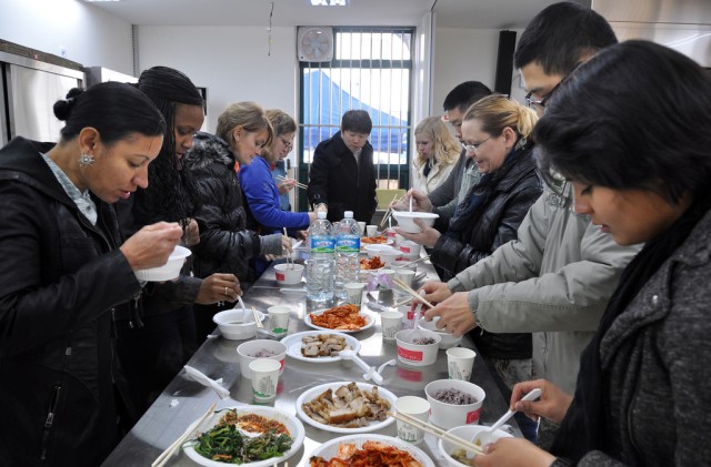 U.S. volunteers make Kimchi for Korean community