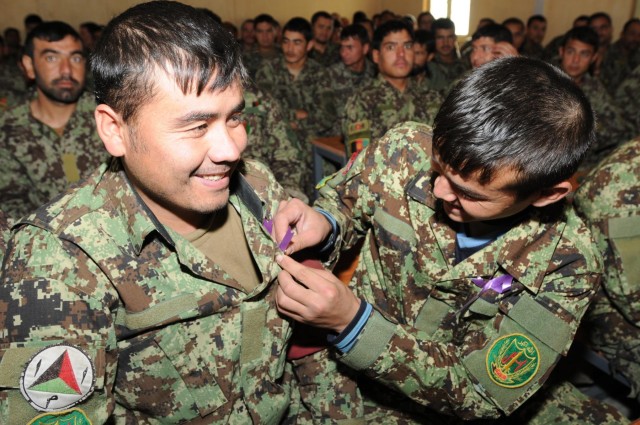 ANA wear purple ribbons, support elimination of violence against women