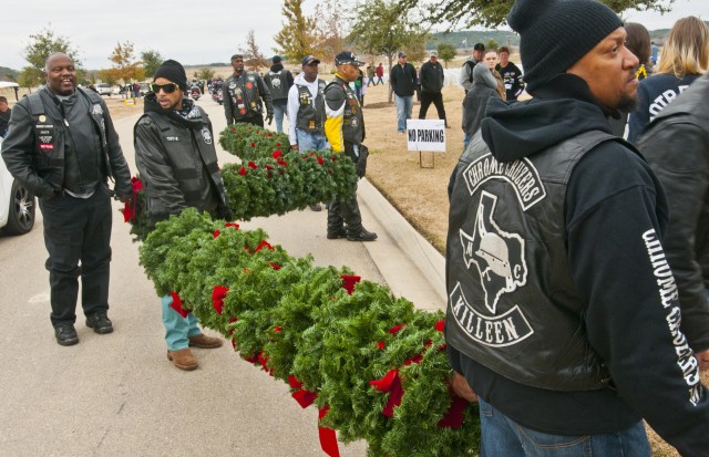 Bikers help place Christmas wreaths on grave markers of fallen heroes