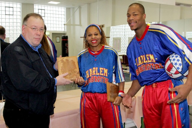 USAG Ansbach presents commemorative plaques to the Harlem Globetrotters