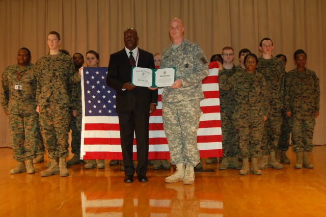 Army recruiter reenlisted by retired Navy officer/high school principal