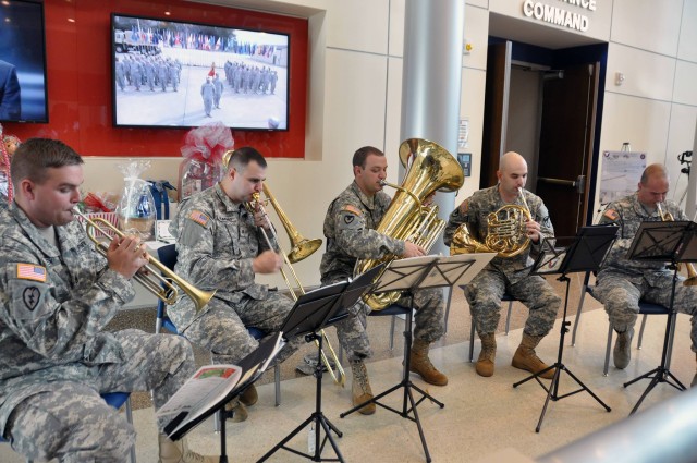 AMC Band plays at the holiday open house and tree lighting