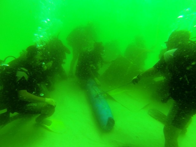 Army, Cambodia divers work together to de-mine Pacific waters