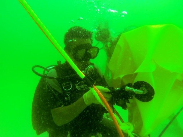 Army, Cambodia divers work together to de-mine Pacific waters