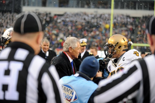 Navy drives past Army, 34-7, In snow-covered showdown