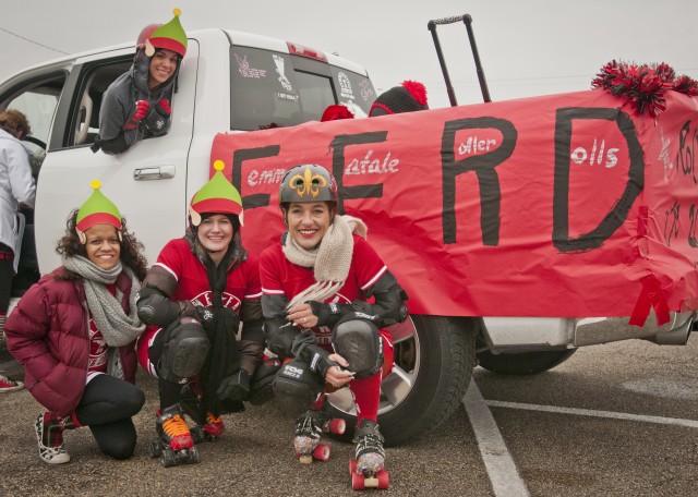 Roller derby team participates in cold Christmas parade