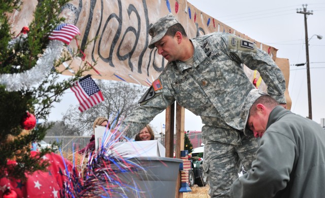 Michigan Guard transportation Soldiers participate in the Gatesville, Texas holiday parade