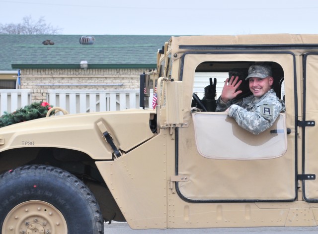 Michigan Guard transportation Soldiers participate in the Gatesville, Texas holiday parade