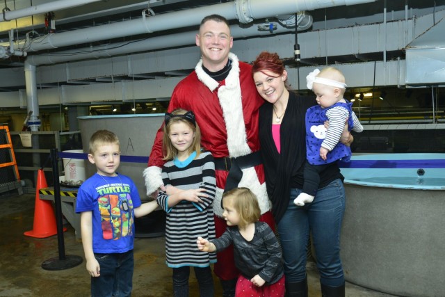Soldier surprises family as Scuba Claus