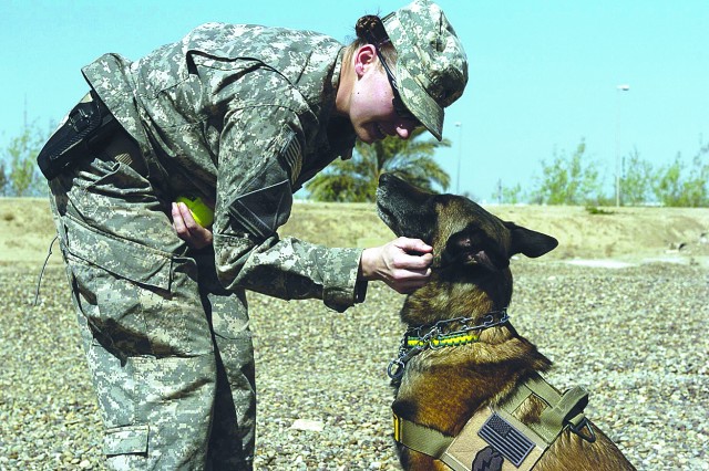 Soldier adopts battle buddy