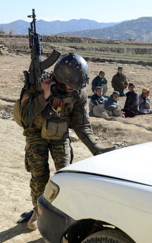 Afghan security forces discuss new checkpoint after clearing operation in Paktika