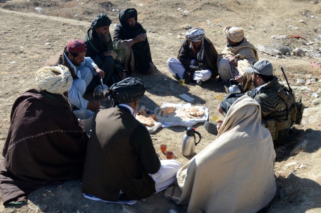 Afghan security forces discuss new checkpoint after clearing operation in Paktika