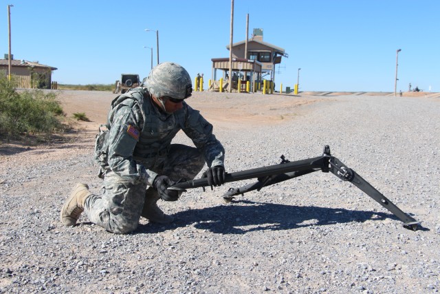 Soldier Deploys M205 Tripod