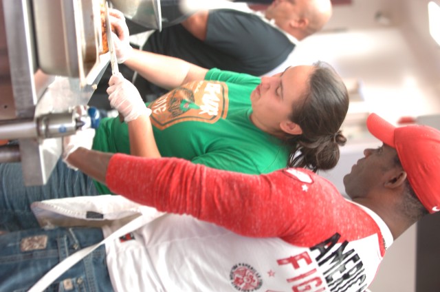 Soldiers lend helping hands at Open Heart Kitchen for those in need
