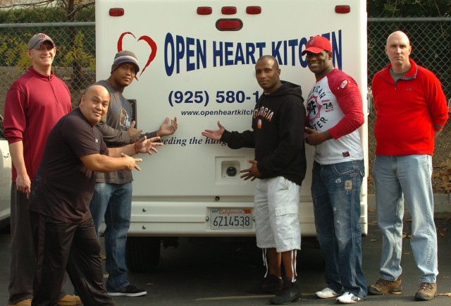 Soldiers lend helping hands at Open Heart Kitchen for those in need