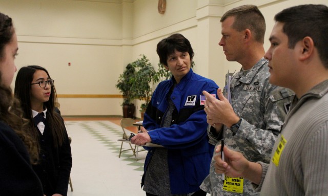 Army trainers judge fourth annual local science fair projects