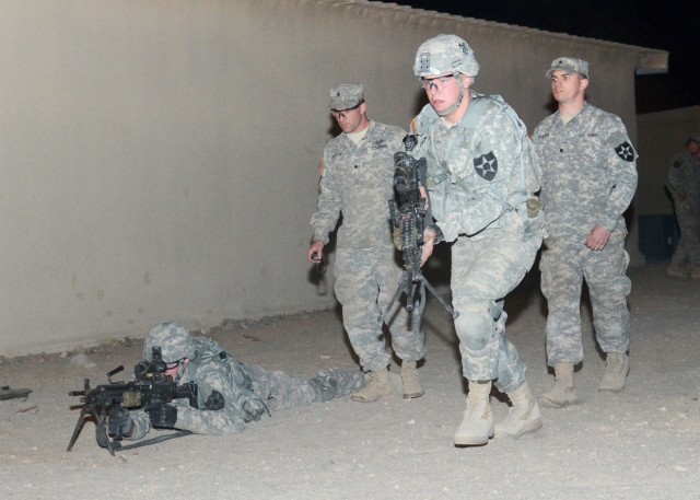 Soldiers of 3-2 SBCT, 7th ID conduct movement under fire (no ammunition) training 