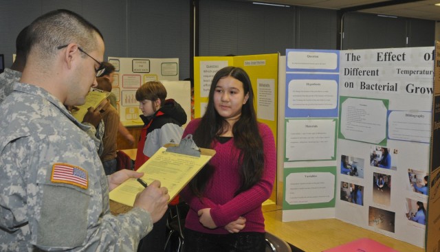 Triple Nickel soldiers judge local science fair