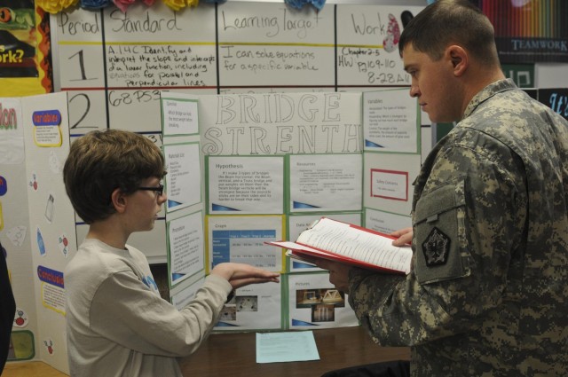 Triple Nickel soldiers judge local science fair