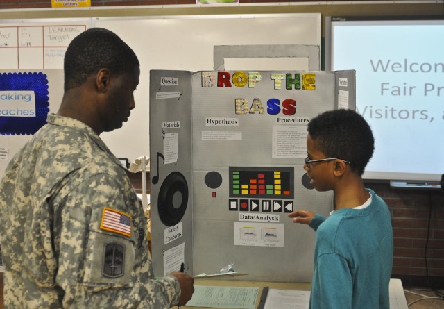 Triple Nickel soldiers judge local science fair