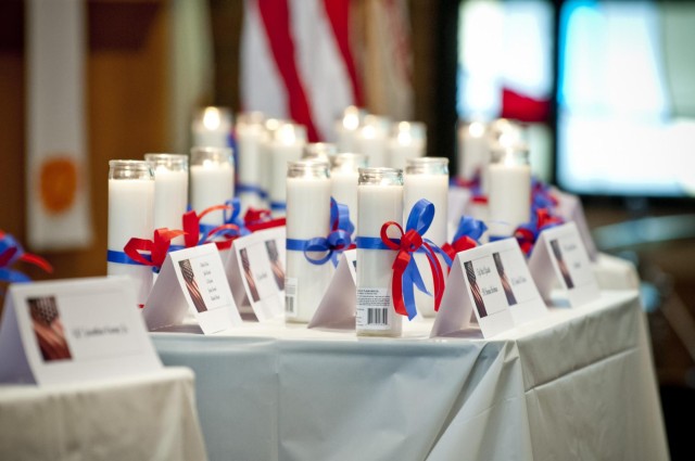 Families gather to light candles in memory of lost service members