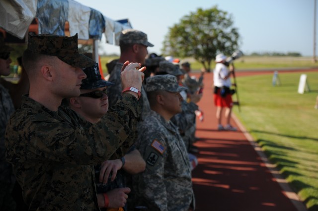 Service members line up to get pictures of their favorite NFL players