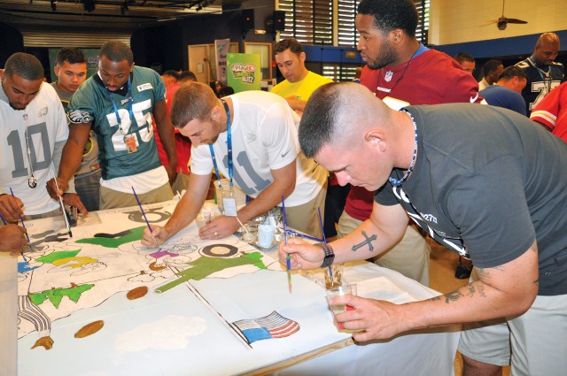 NFL Pro Bowl stars share time with wounded warriors, community