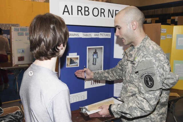 Marines, soldiers volunteer as judges for local science fair
