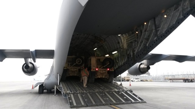 401st AFSBn-Kandahar drivers load six MATVs on C-17