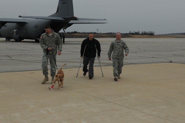 Wounded K-9 team returns home