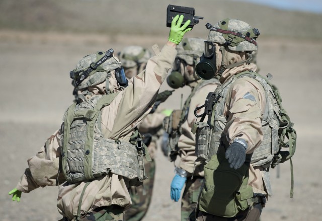 Soldiers monitor possible contamination during WMD training exercise