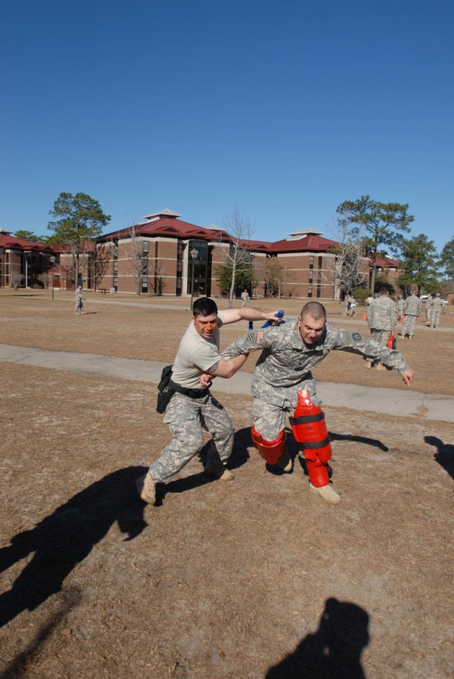 Vanguard military police certify with painful spray