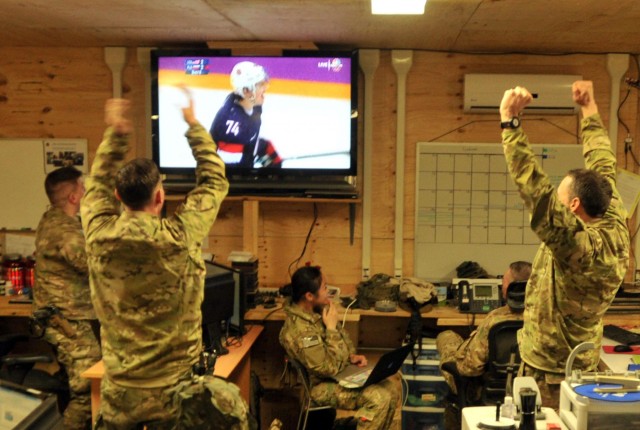 Deployed soldiers celebrate hockey win over Russia