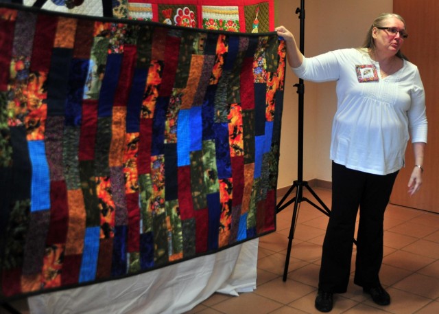 DA Civilian, Army officer gives back to the community one stitch at a time