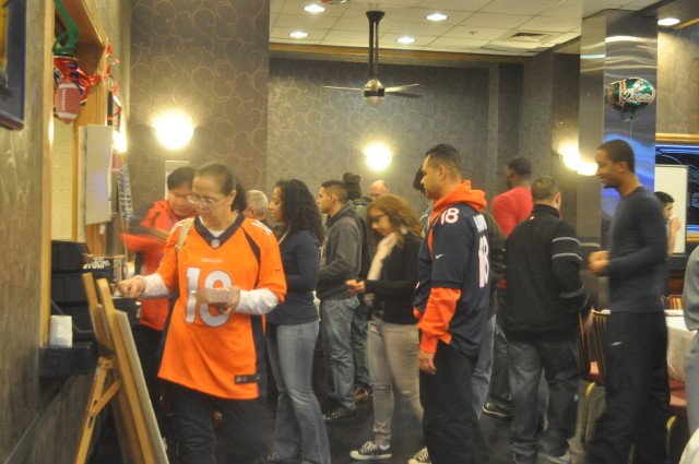 Football fans enjoy community Super Bowl party