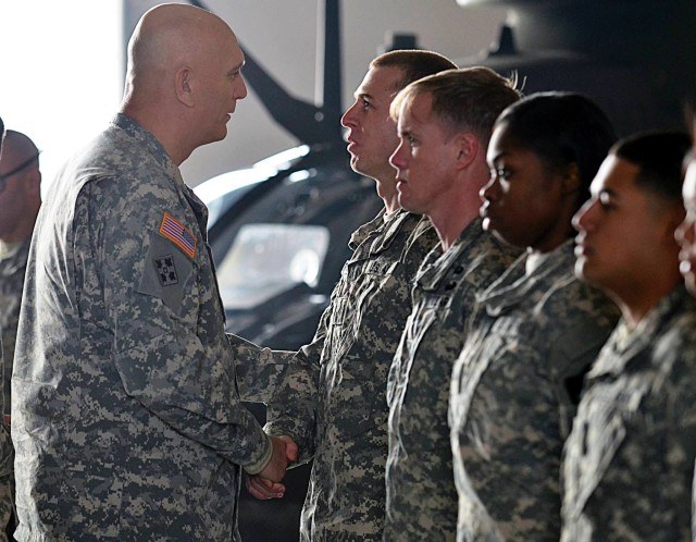 Odierno awards coins to 2nd Infantry Division Soldiers