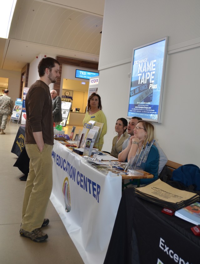 A customer talks to representatives from the Education Center.