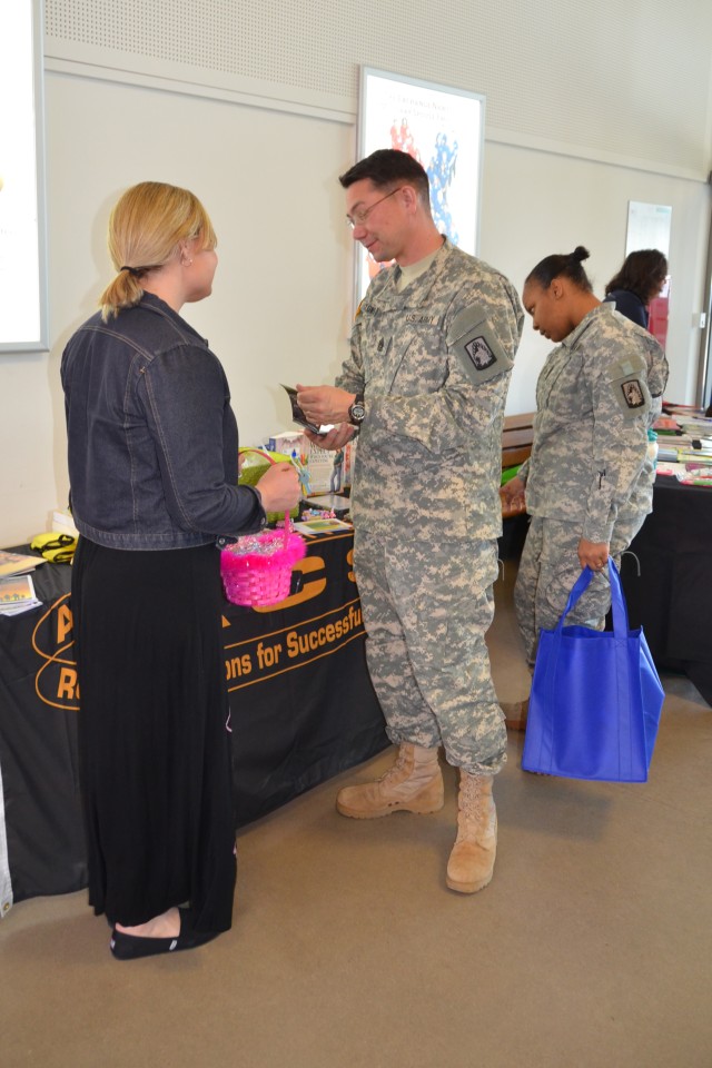 Service members look for information from Army Community Service.