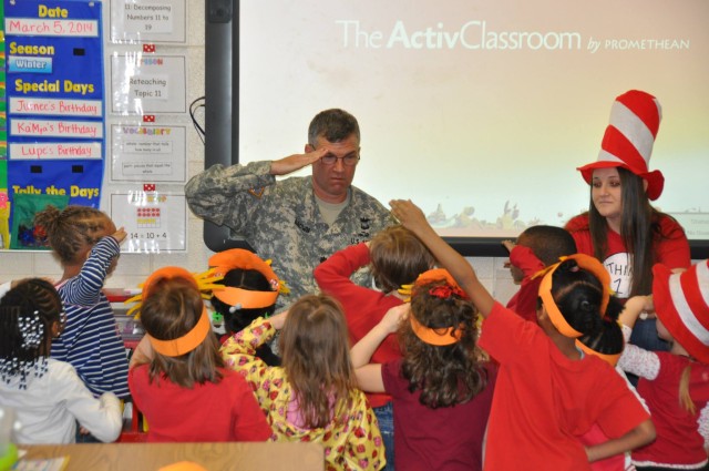 Lt. Col. Christopher Brown reads kindergarteners