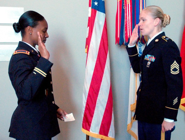 Local soldier re-enlists, honored at Women's Memorial