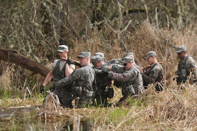 Soldiers endure rain, water for silver spurs