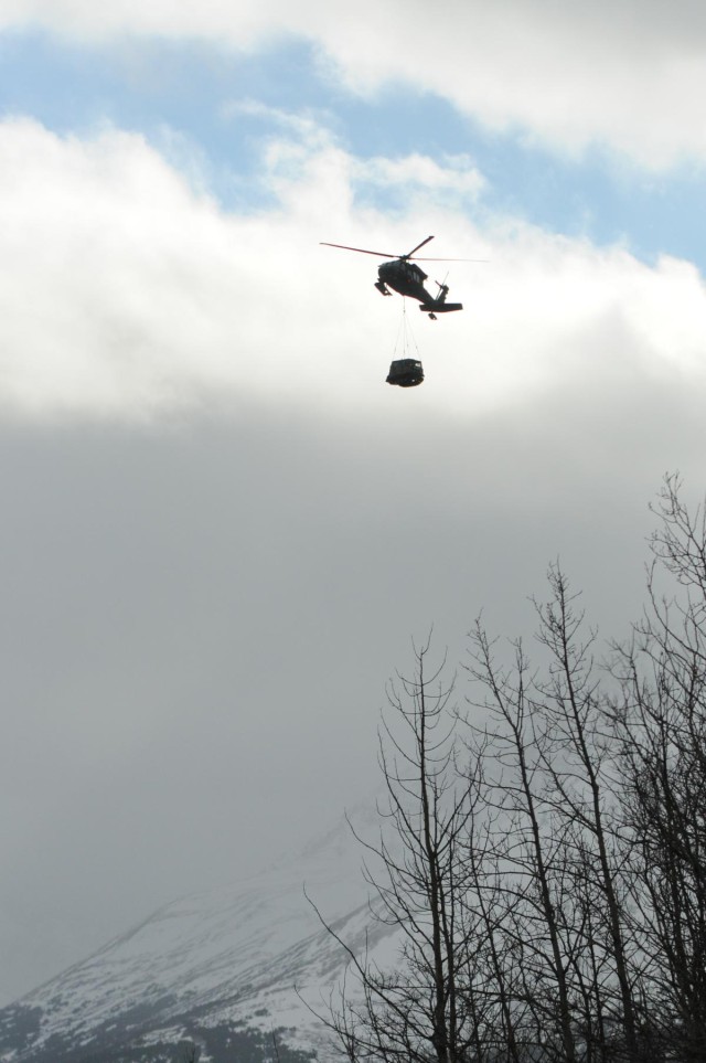 '1-Geronimo' snipers shoot from Black Hawk platform
