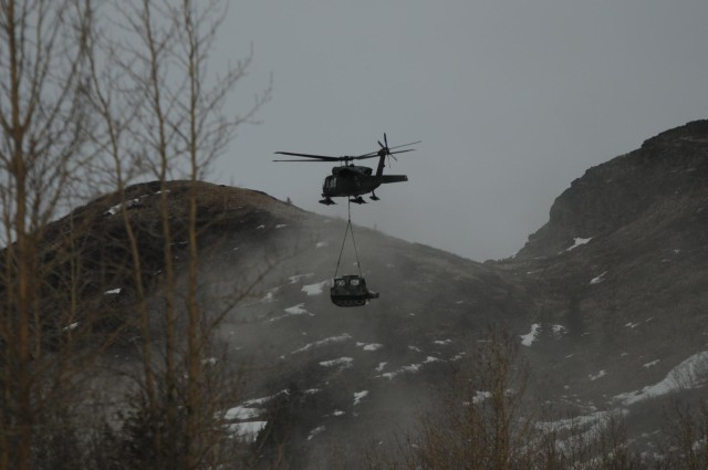 '1-Geronimo' snipers shoot from Black Hawk platform