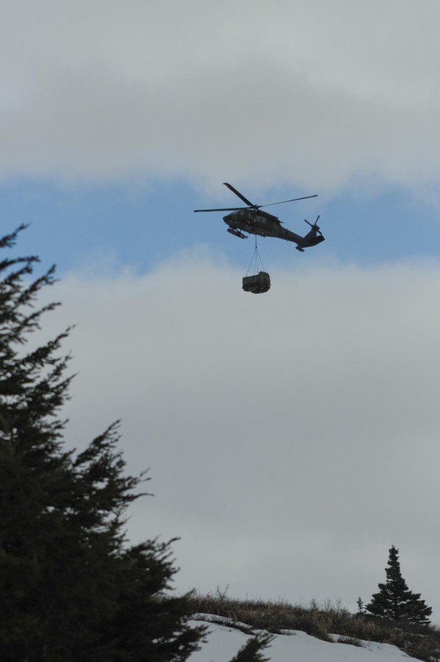 '1-Geronimo' snipers shoot from Black Hawk platform