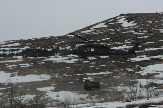 '1-Geronimo' snipers shoot from Black Hawk platform